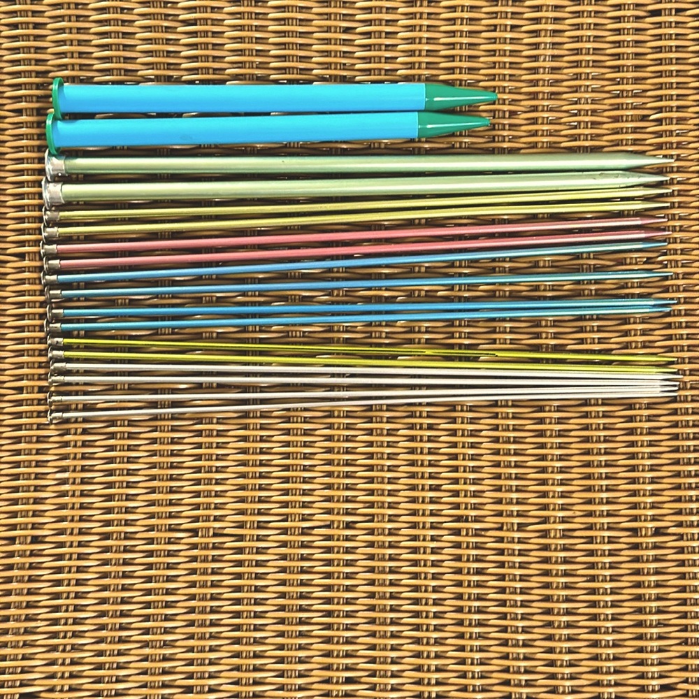 9 Sets of knitting needles - sizes 3-9, 15, plastic and metal